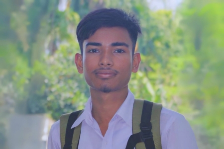 Md Anisujjaman enjoying a peaceful moment in nature as a student.